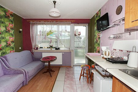 Apartament liliowy z aneksem kuchennym,balkonem,łazienką